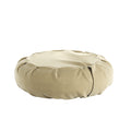 Beige zafu meditation cushion. 